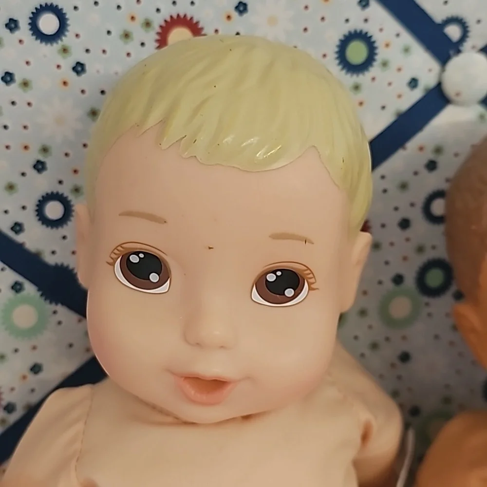 2 cute soft body dolls blonde hair and dark